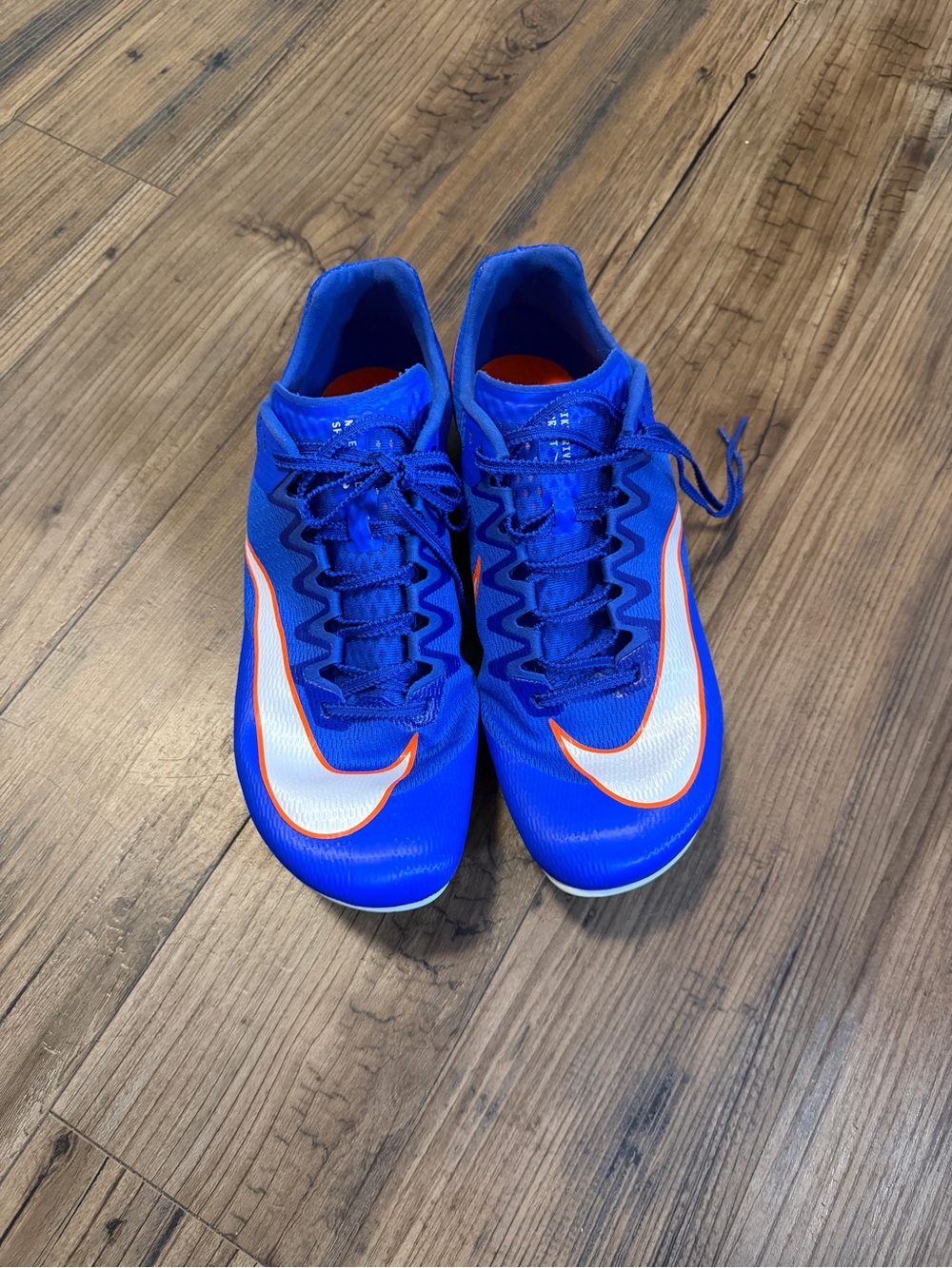 Nike mens track and field spikes with White & Orange Swoosh size 11 men
